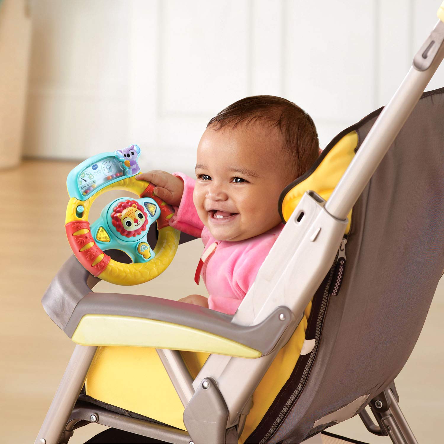 VTech Grip and Go steering wheel signal lights flash with tunes for attention