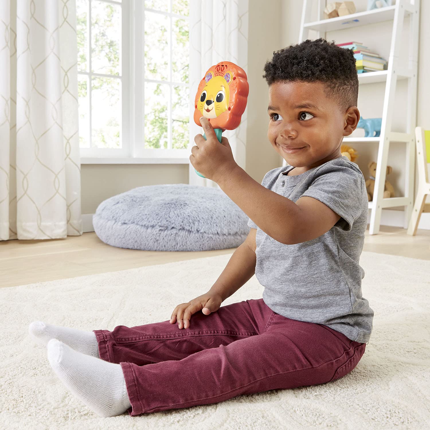 VTech I See Me Lion Mirror handheld design fits little hands.
