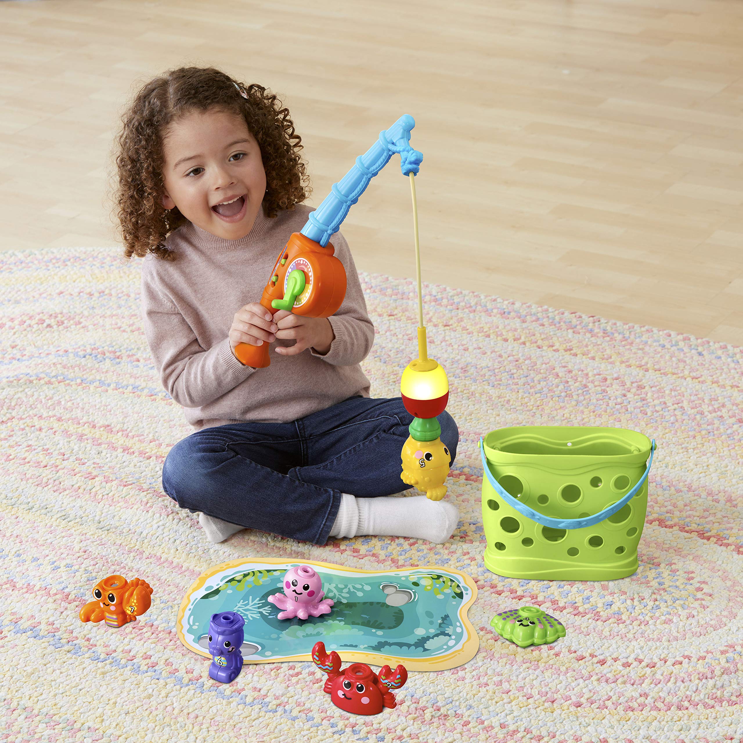 VTech Jiggle and Giggle Fishing Set provides engaging songs and phrases for interactive play.