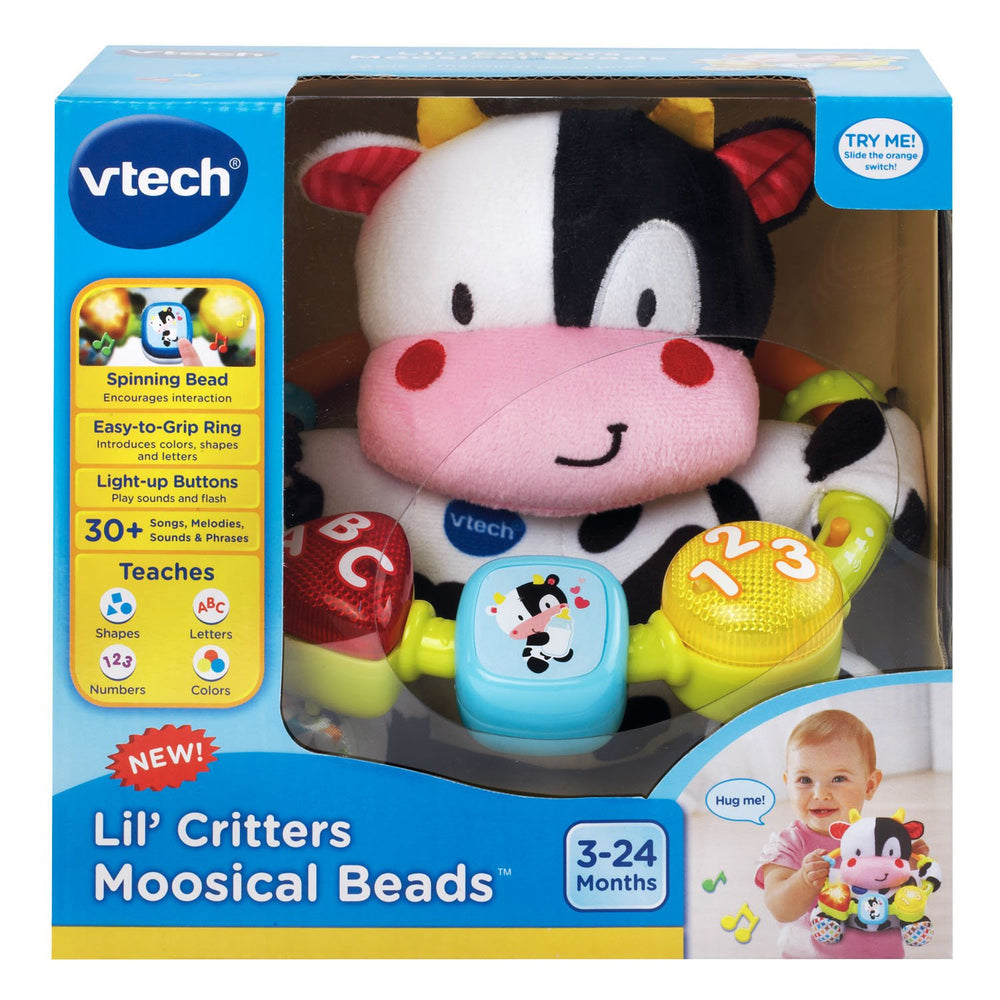 Compact plush cow toy by VTech for crib or diaper bag