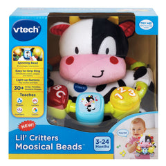 Compact plush cow toy by VTech for crib or diaper bag