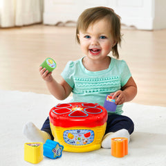 VTech Sort and Discover Drum yellow dump-top feature for quick reset