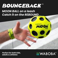Waboba Bounceback Moon Ball in mid-air with extreme bounce, ideal for energetic outdoor fun.