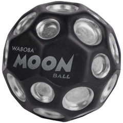 Waboba Moon Ball crater texture close-up boosts dynamic play outdoors.