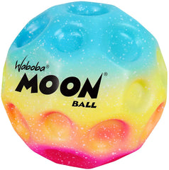 Waboba Moon Ball Gradient Two Pack in mid-bounce demonstrates high-bounce potential.