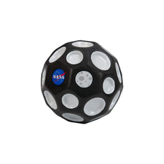 Waboba Moon Ball bouncing high for outdoor play on any surface.