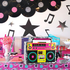 Package includes blindfold and stick for interactive 80s party games with Waenerec.