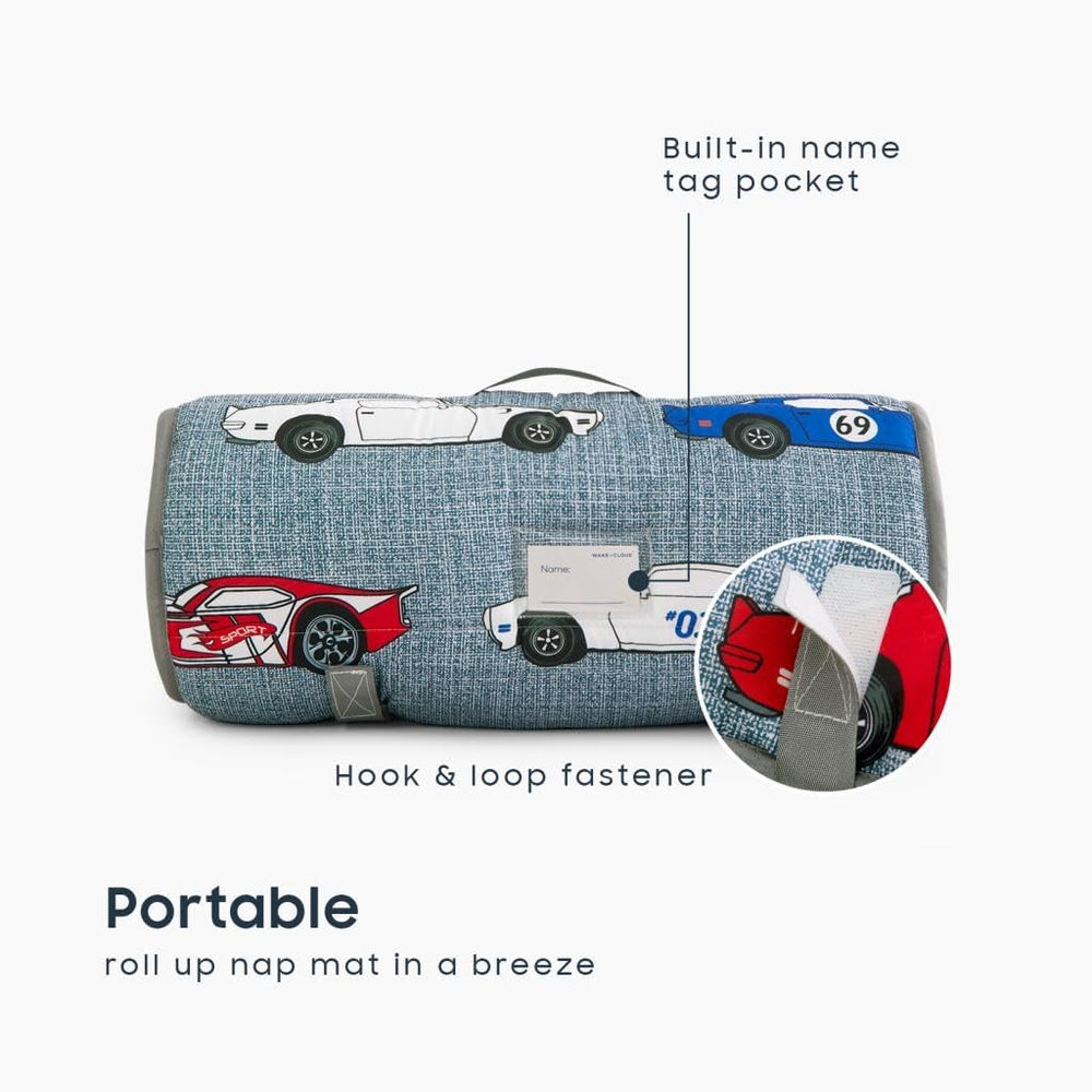 Wake In Cloud nap mat roll-up with handle for easy transport.