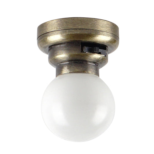 Close-up of Waldosia brass LED ceiling light emitting a warm, realistic glow in a mini scene.