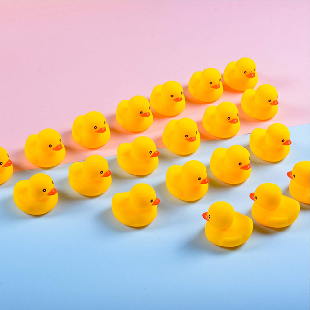 WAMSOLE rubber duck bath toy floating in water for bath time fun.