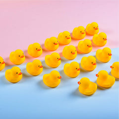 WAMSOLE rubber duck bath toy floating in water for bath time fun.