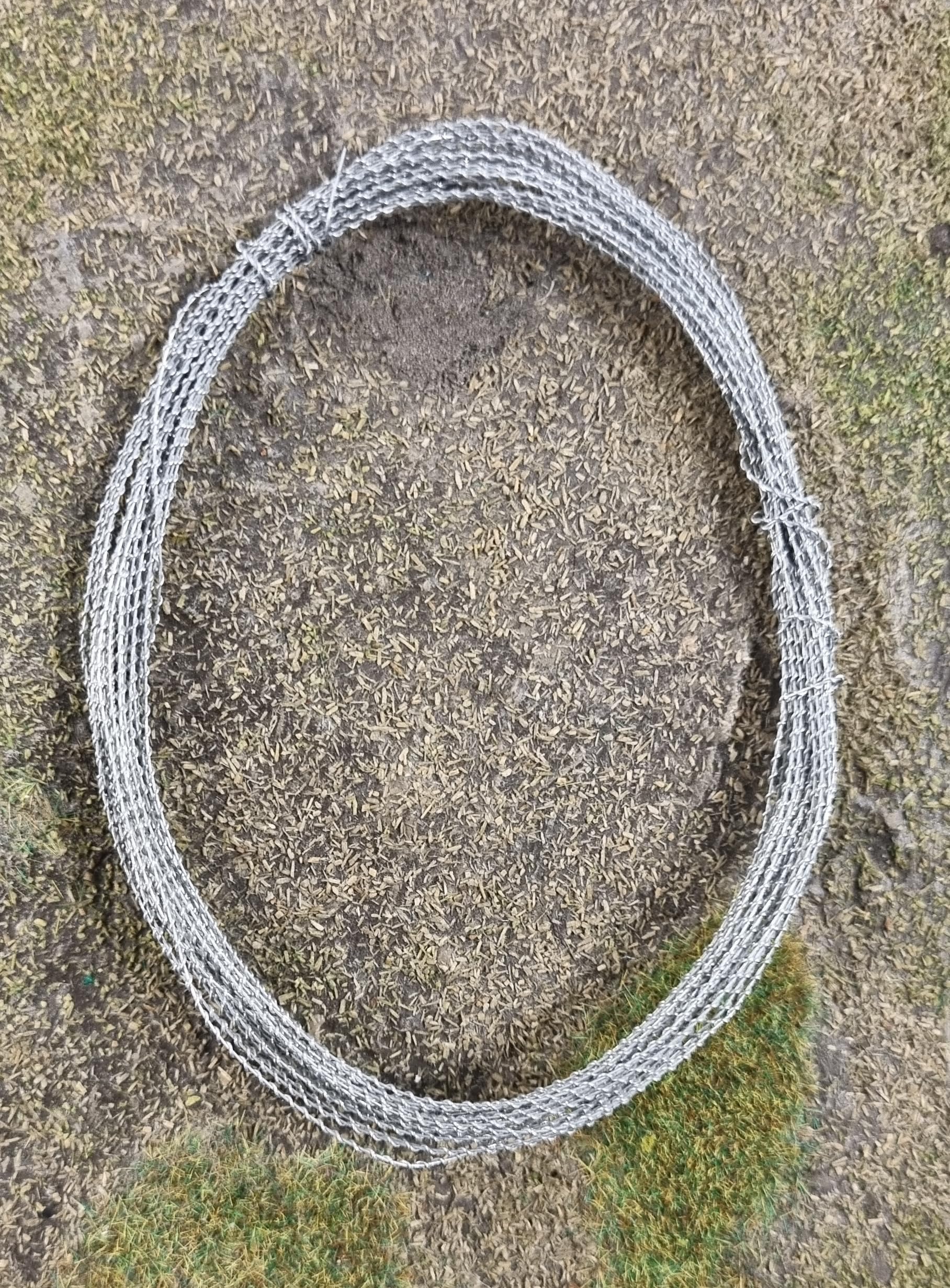 Warlord Games barbed wire 5m miniature bases ornament accentuates barricade realism on battlefield tables.