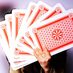 Warmtree bar-game setup with jumbo cards emphasizing social play and visibility.