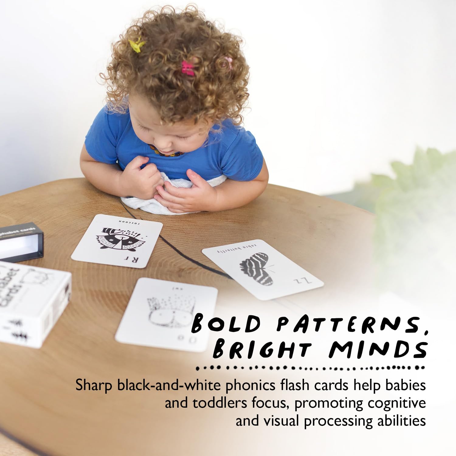 Wee Gallery double-sided-letter-animal-flashcards enable interactive alphabet play.