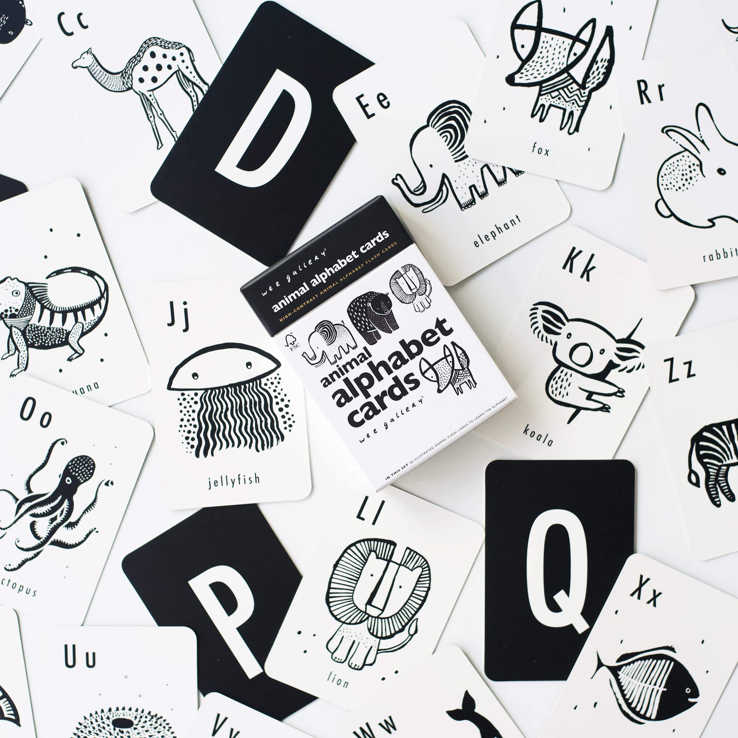 Wee Gallery interactive-learning-flashcards invite playful practice of letters and shapes.