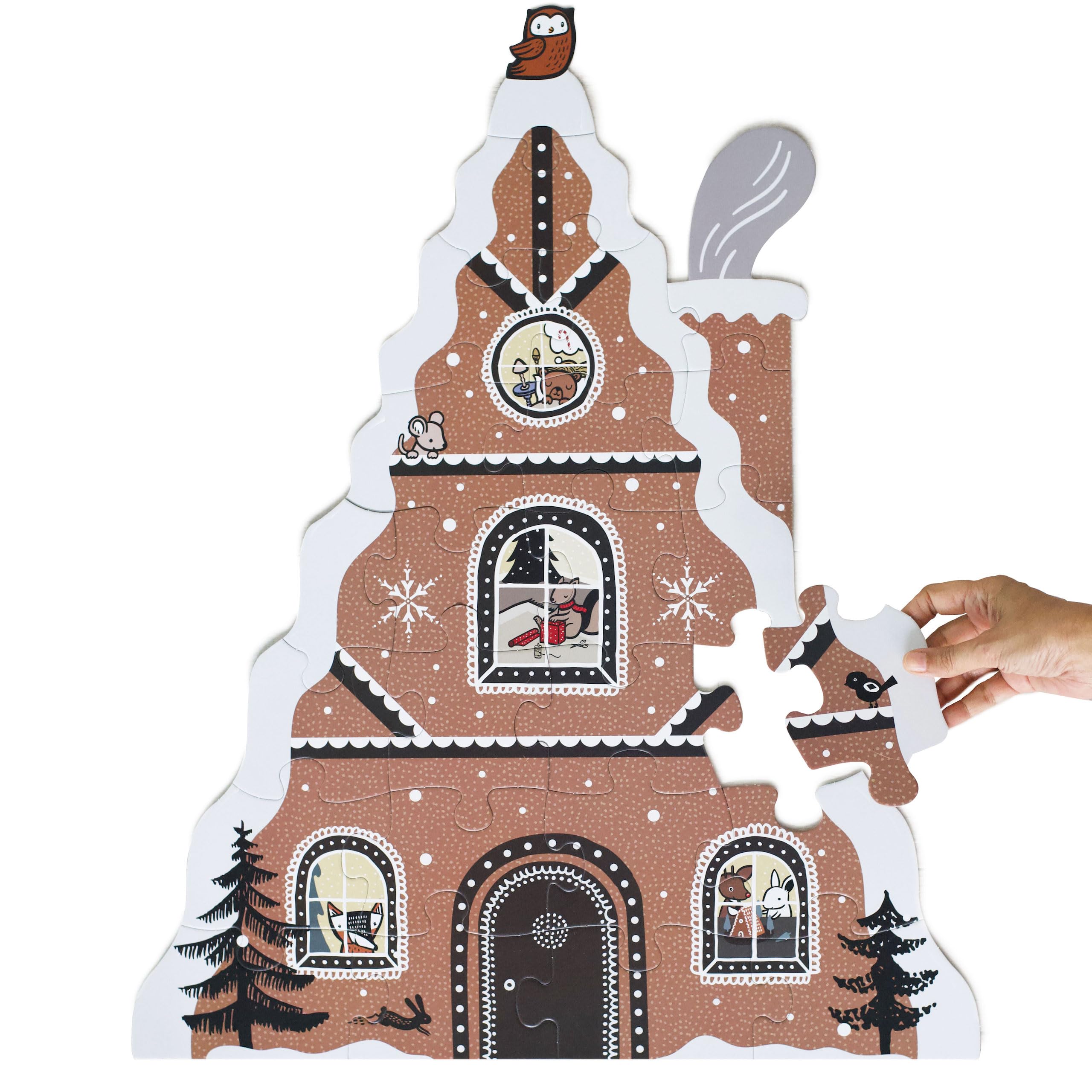 Wee Gallery gingerbread house floor puzzle box encourages early problem-solving for toddlers.