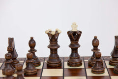 Wegiel board with built in felt base and slotted storage for travel