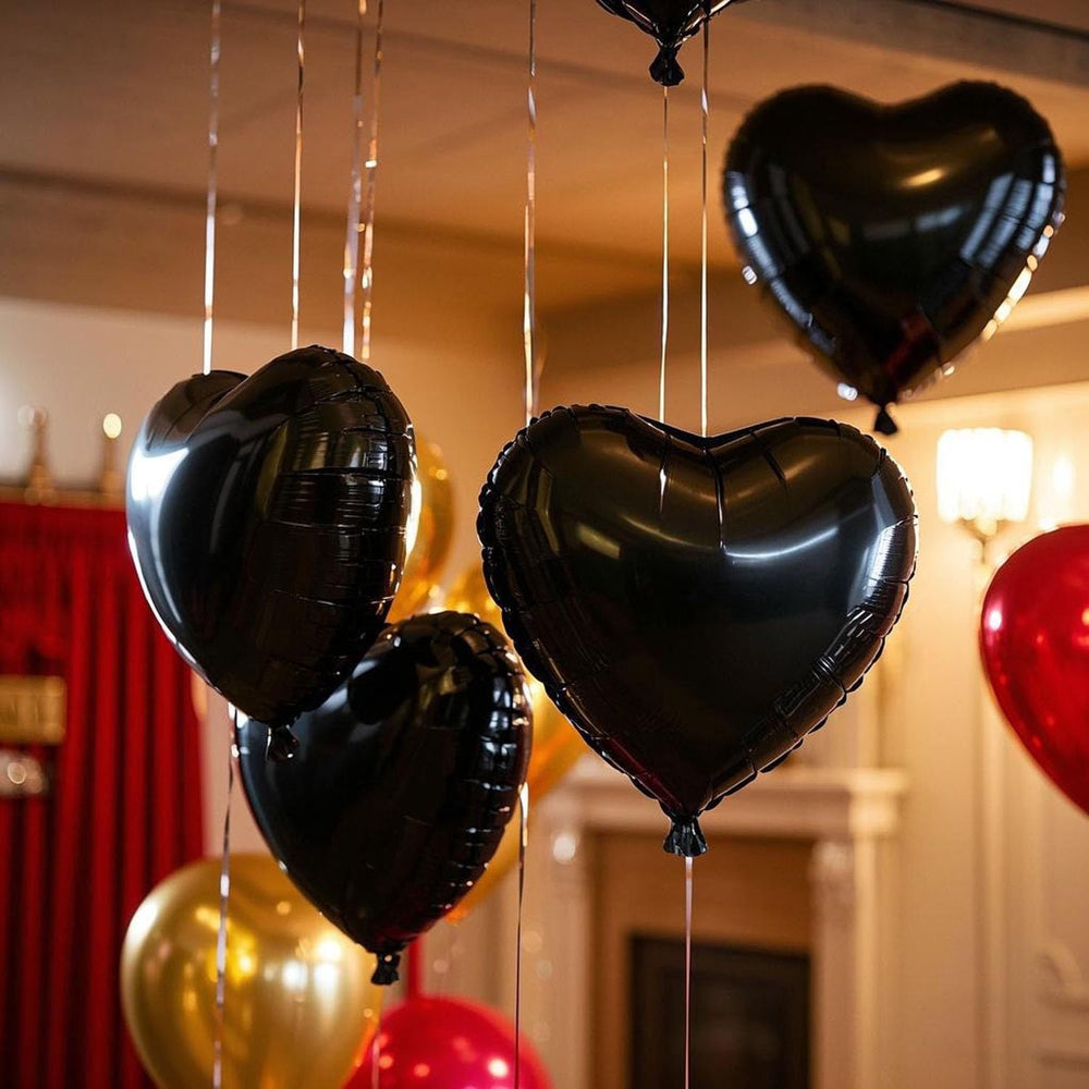 WEIKA 18inch black heart balloon foil party setup with ribbons and backdrop.