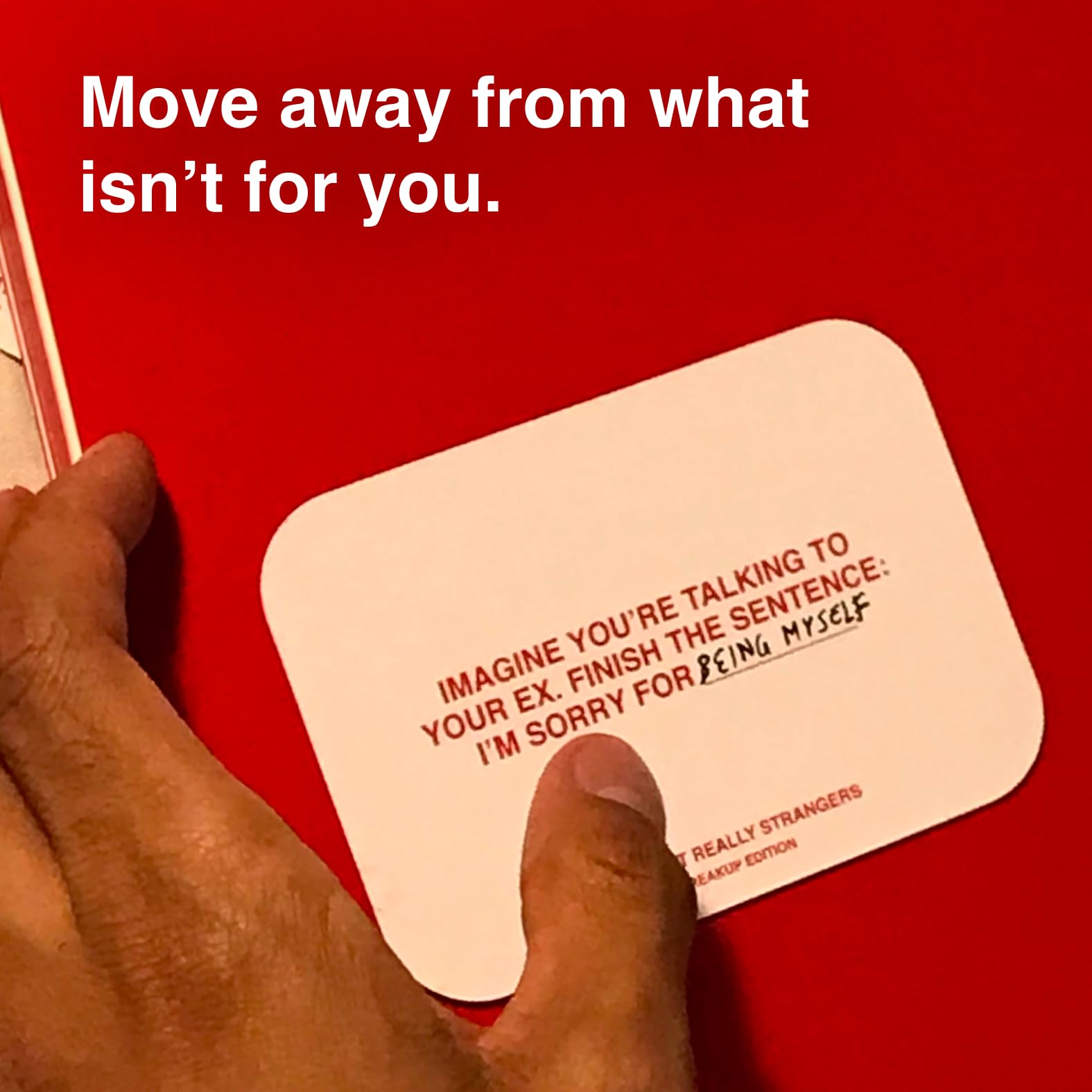WE'RE NOT REALLY STRANGERS card close-up showing varied prompts for self-discovery.