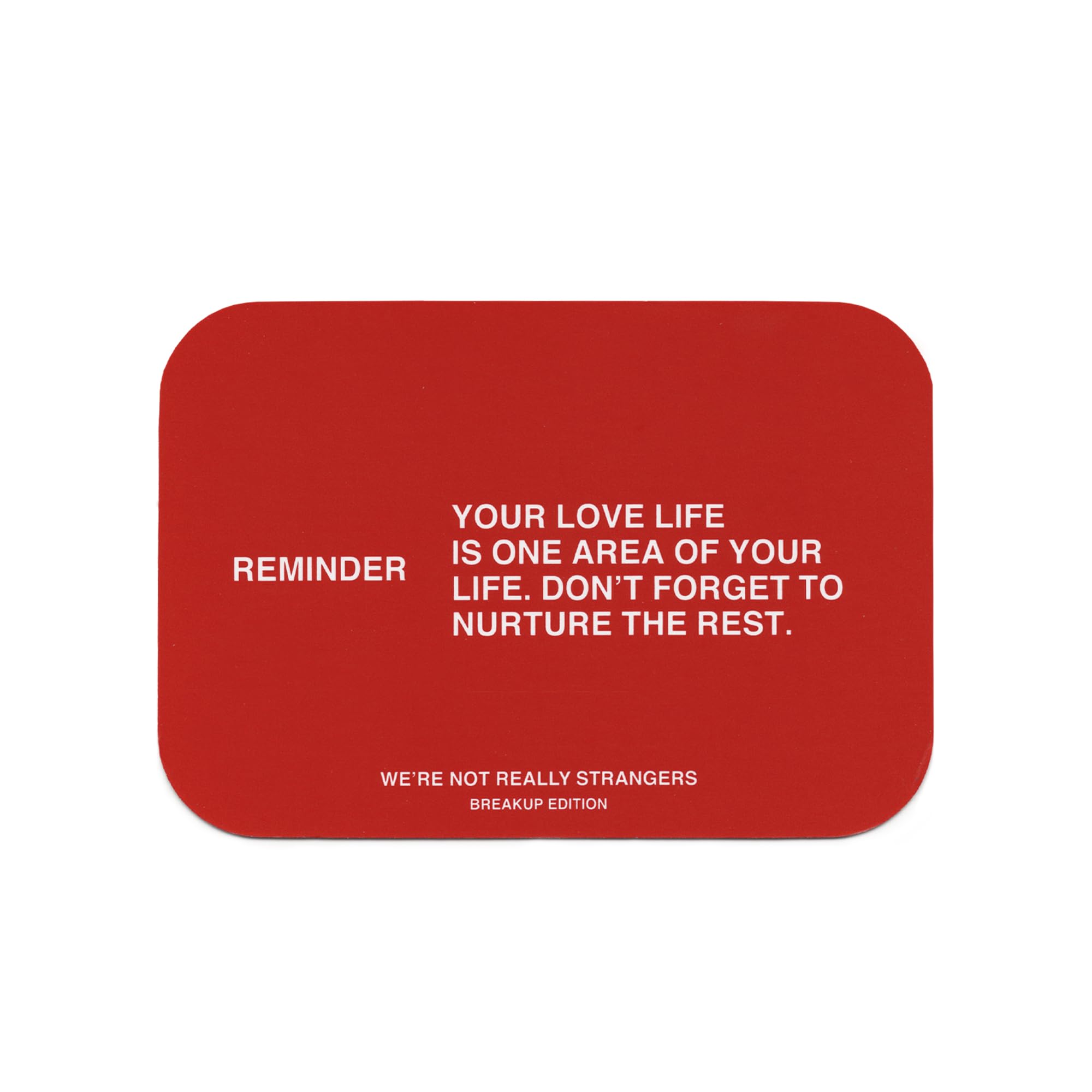 WE'RE NOT REALLY STRANGERS packaging highlights a compact, portable breakup kit for healing.