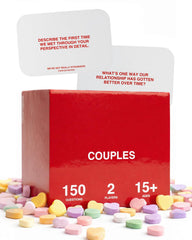 Two players enjoying a date night at home using the cards.