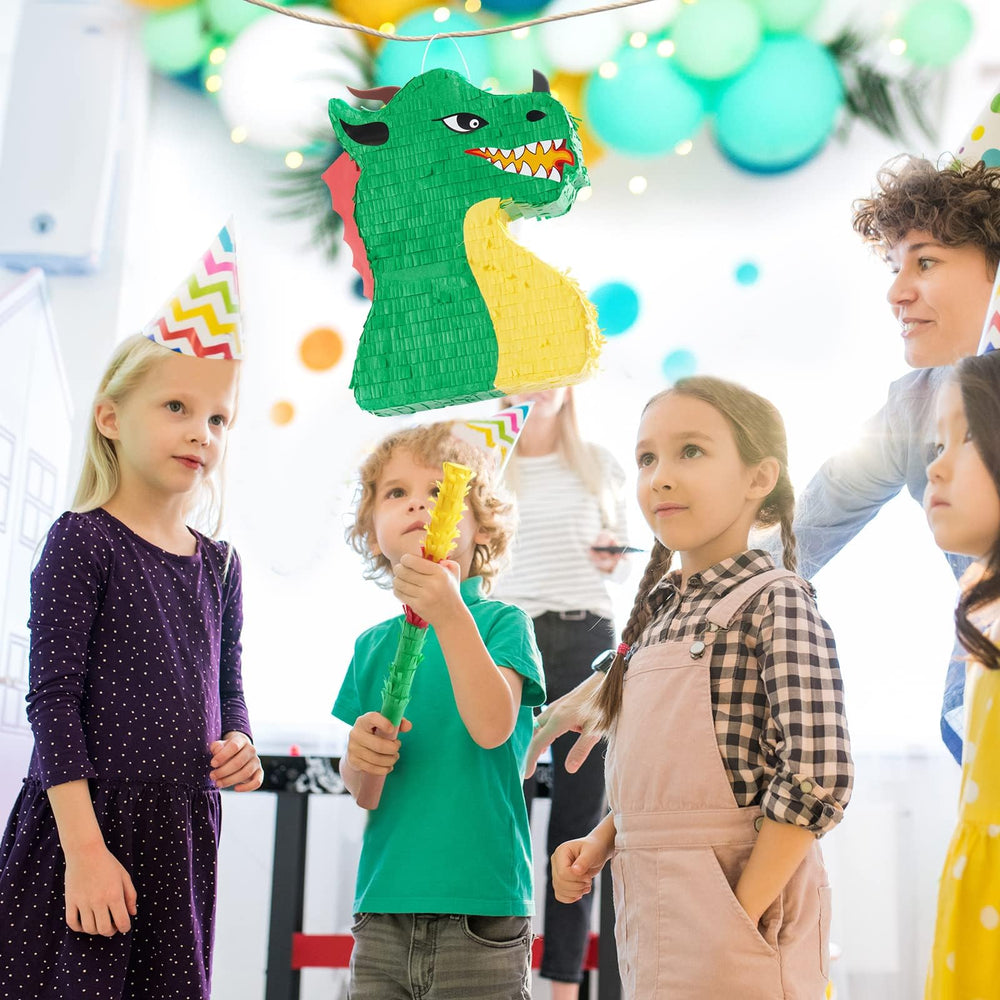 WERNNSAI Dino party room decor using pinata as a centerpiece backdrop