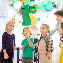WERNNSAI Dino party room decor using pinata as a centerpiece backdrop