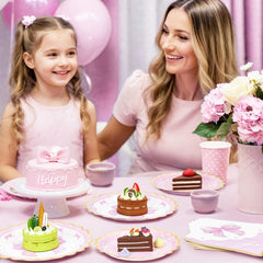 WERNNSAI pink-themed setting showcases coordinated tableware for a stylish party.