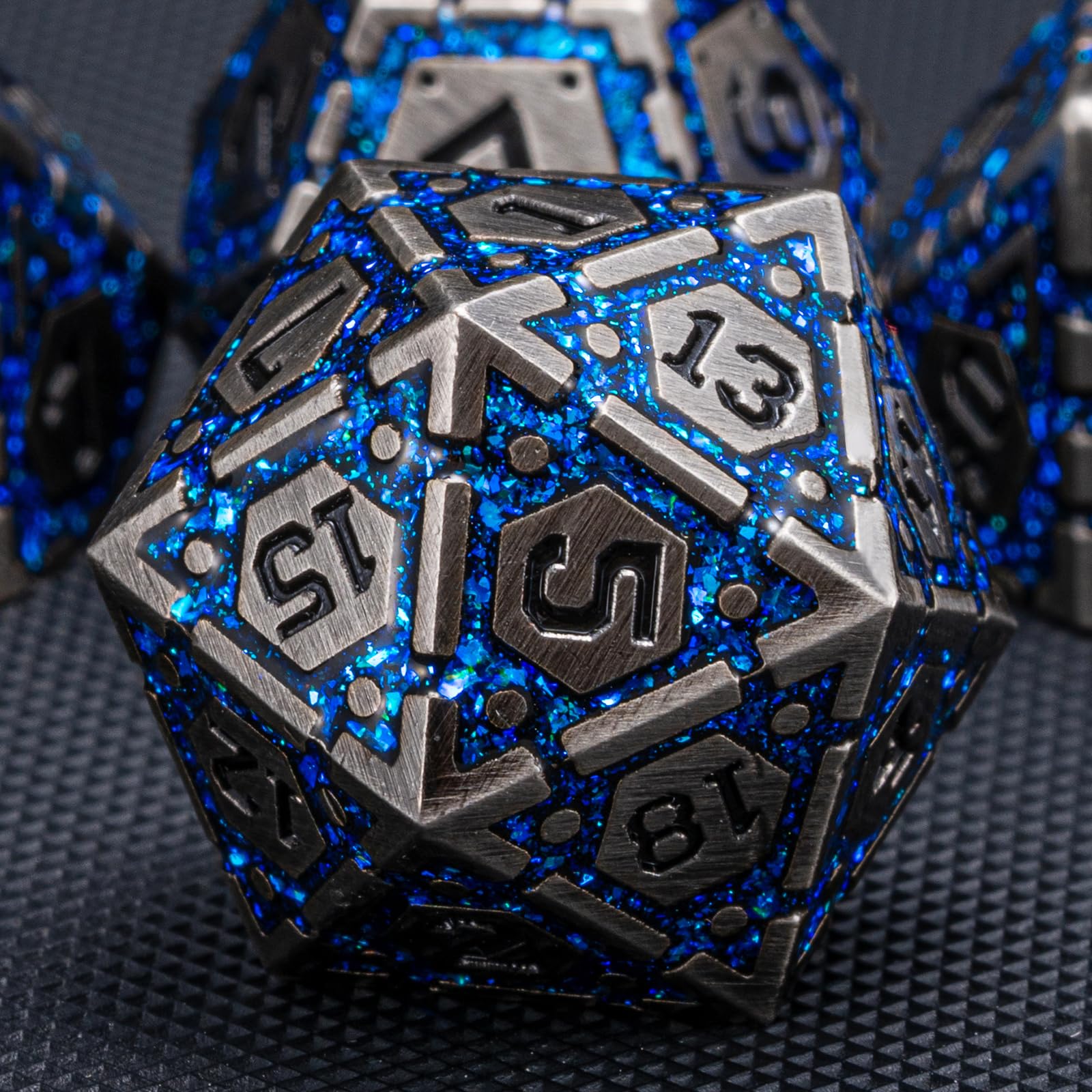 Weyano DND metal dice set antique nickel blue closeup engraving highlights premium craftsmanship.