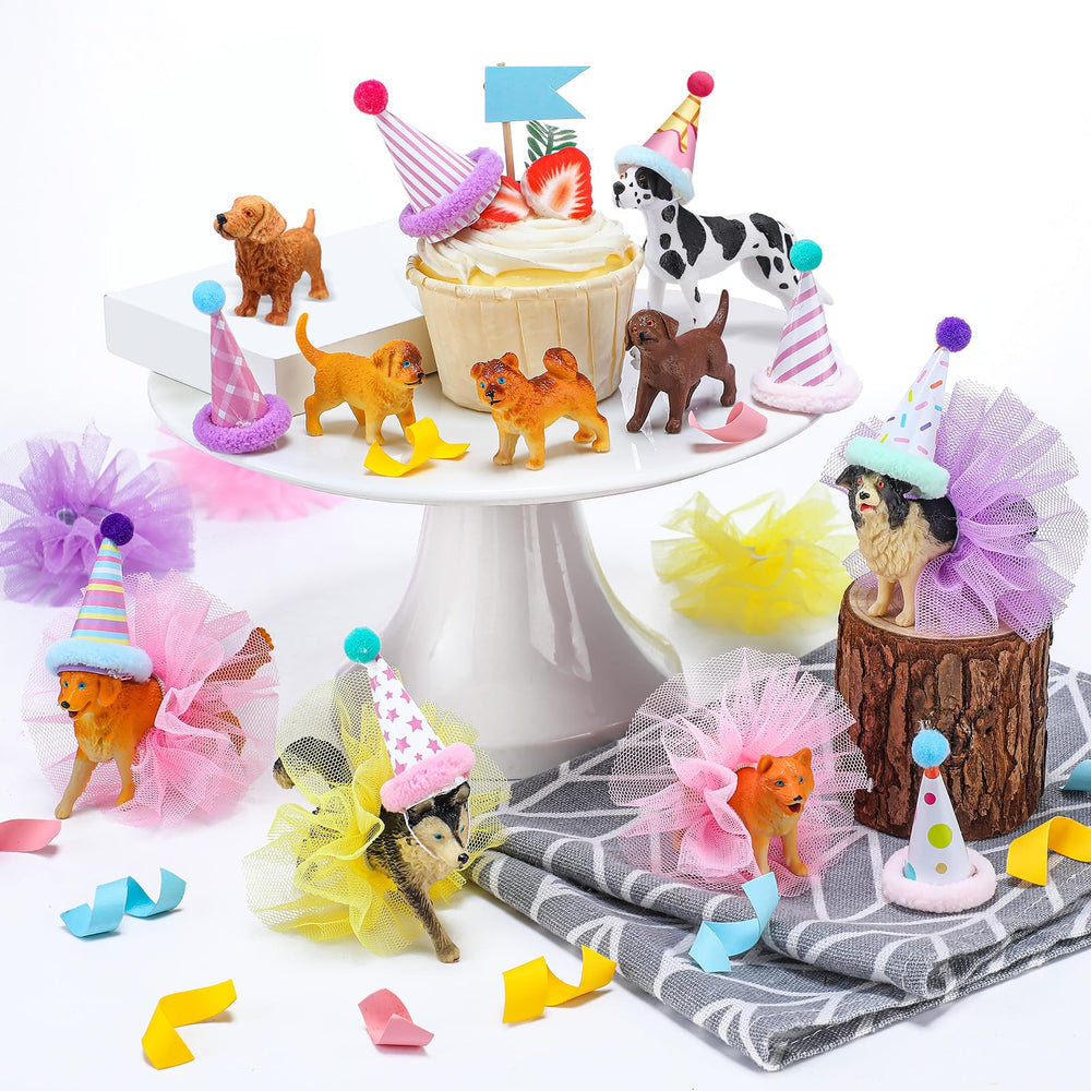 Weysat dog figurines decorate cupcakes for a pet-themed party.