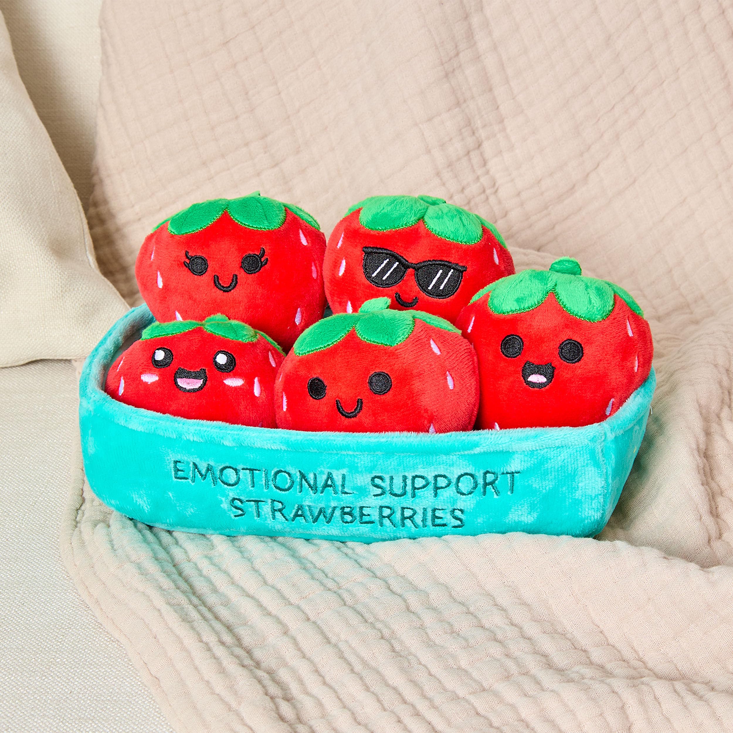 WHAT DO YOU MEME? Emotional Support Strawberries on a desk, cheerful decor and conversation starters.