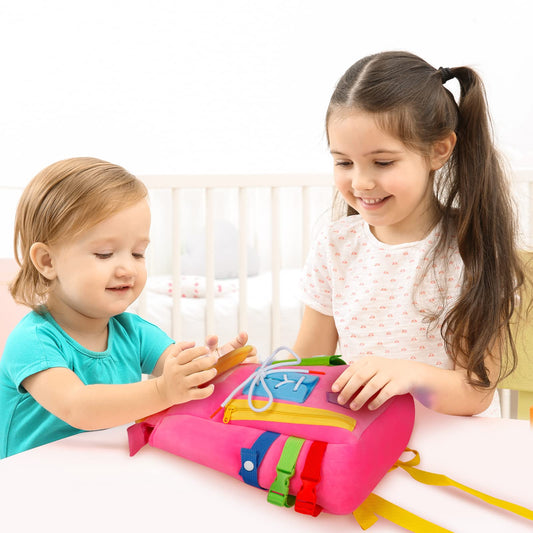 WHITE DOLPHIN TOYS Busy Board shows soft number straps for early math practice.