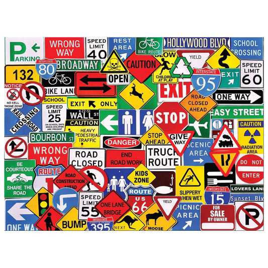 White Mountain Road Signs 500pc puzzle front view with vibrant road-sign collage for family time.