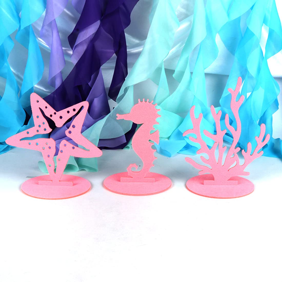 WIDELL pink mermaid centerpiece seahorse detail enhances kid-friendly mermaid birthday table.