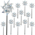 Winemana reflective pinwheels sparkle in sunlight to deter birds in the garden.