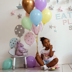 WinkyBoom pastel balloons usable with helium or air for flexible setups.