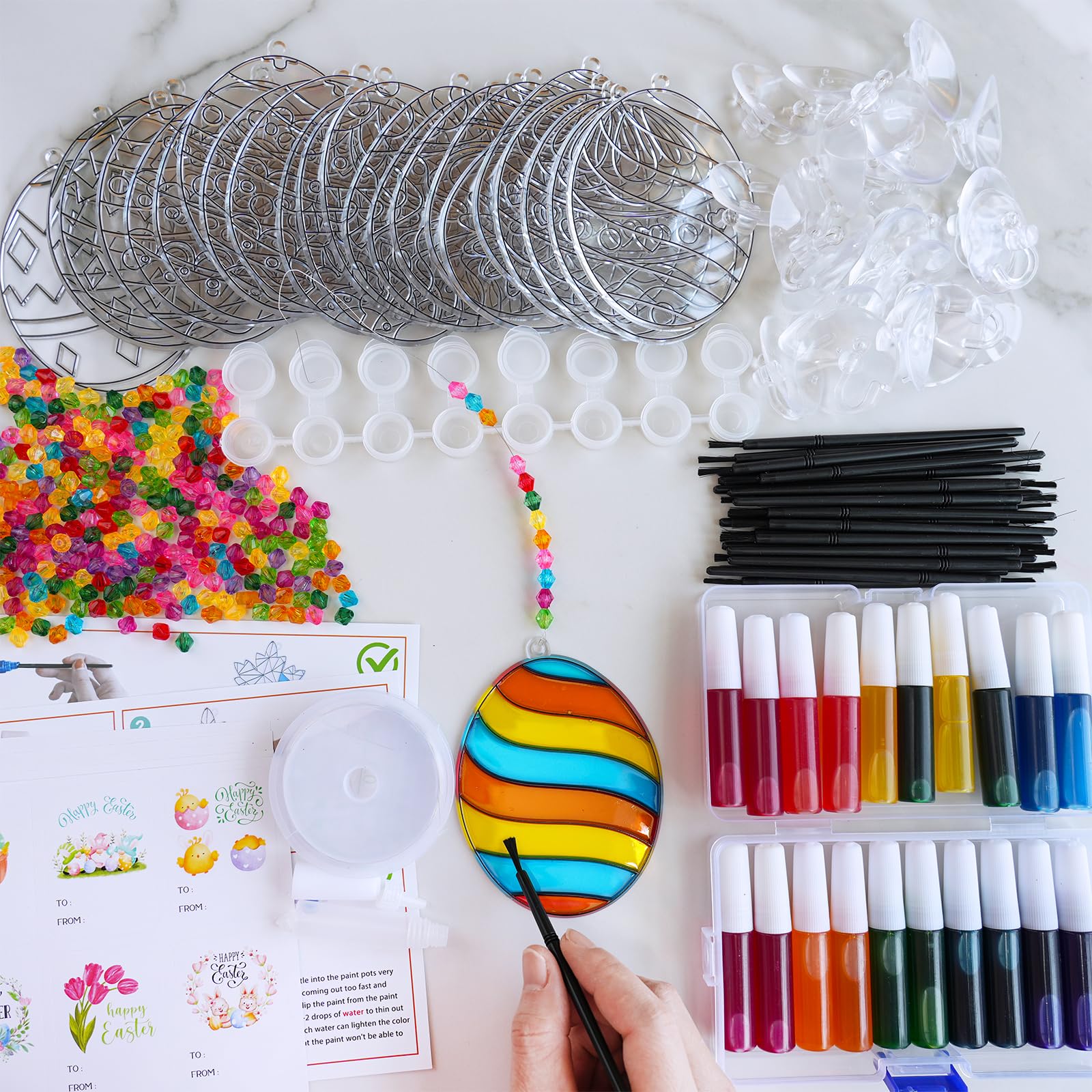 Winlyn suncatcher paints set offers Easter hues for sun-catching art.