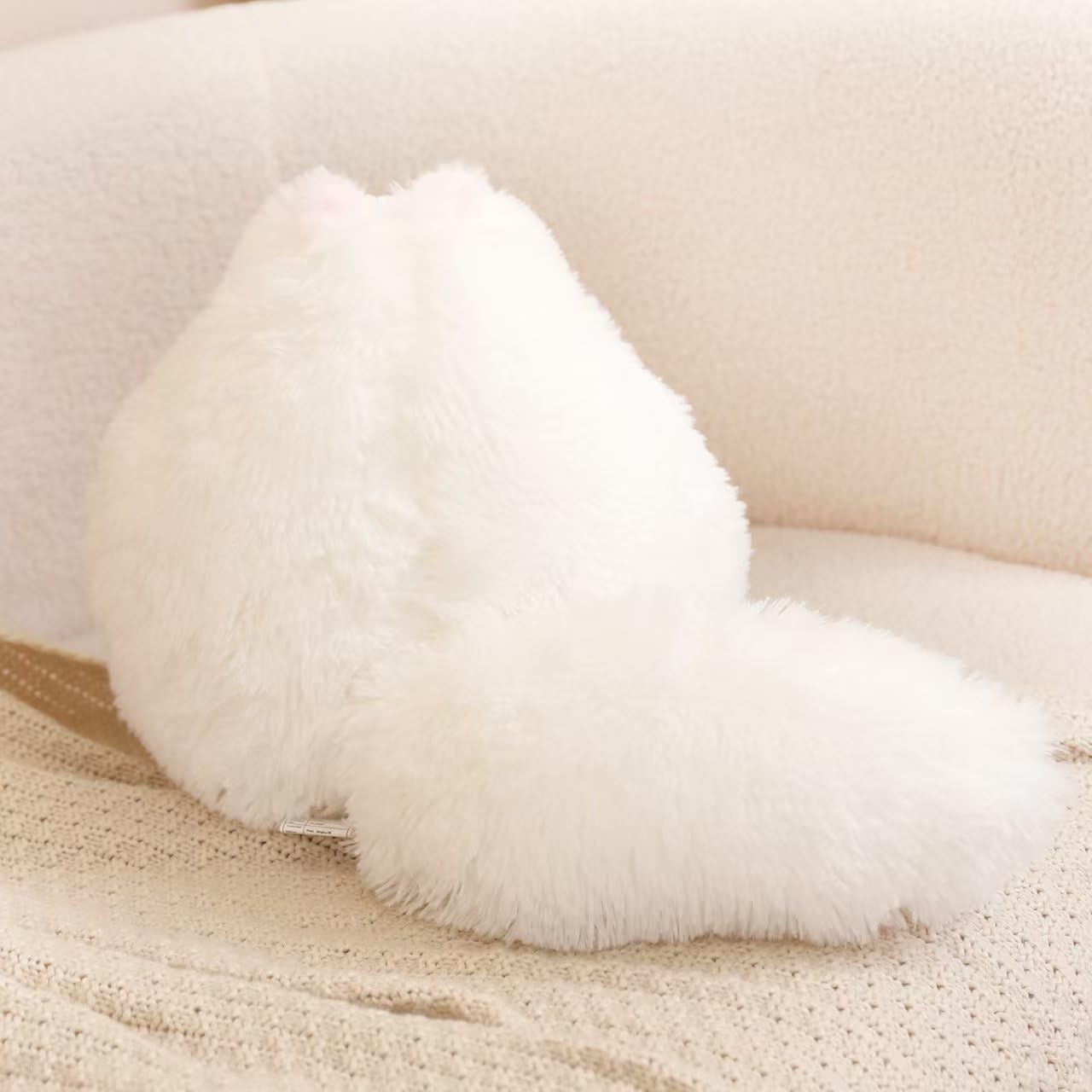 Winsterch fluffy white cat face features tiny eyes and a pink nose for charm