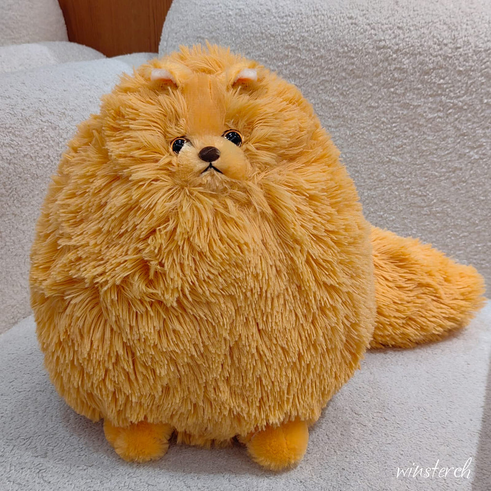 Winsterch orange cat stuffed animal close-up face, cute features