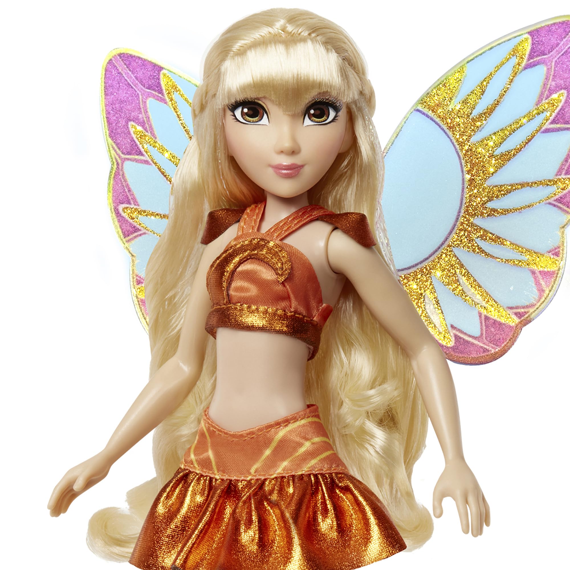 Winx Club Stella face closeup captures cheerful sunlit expression.