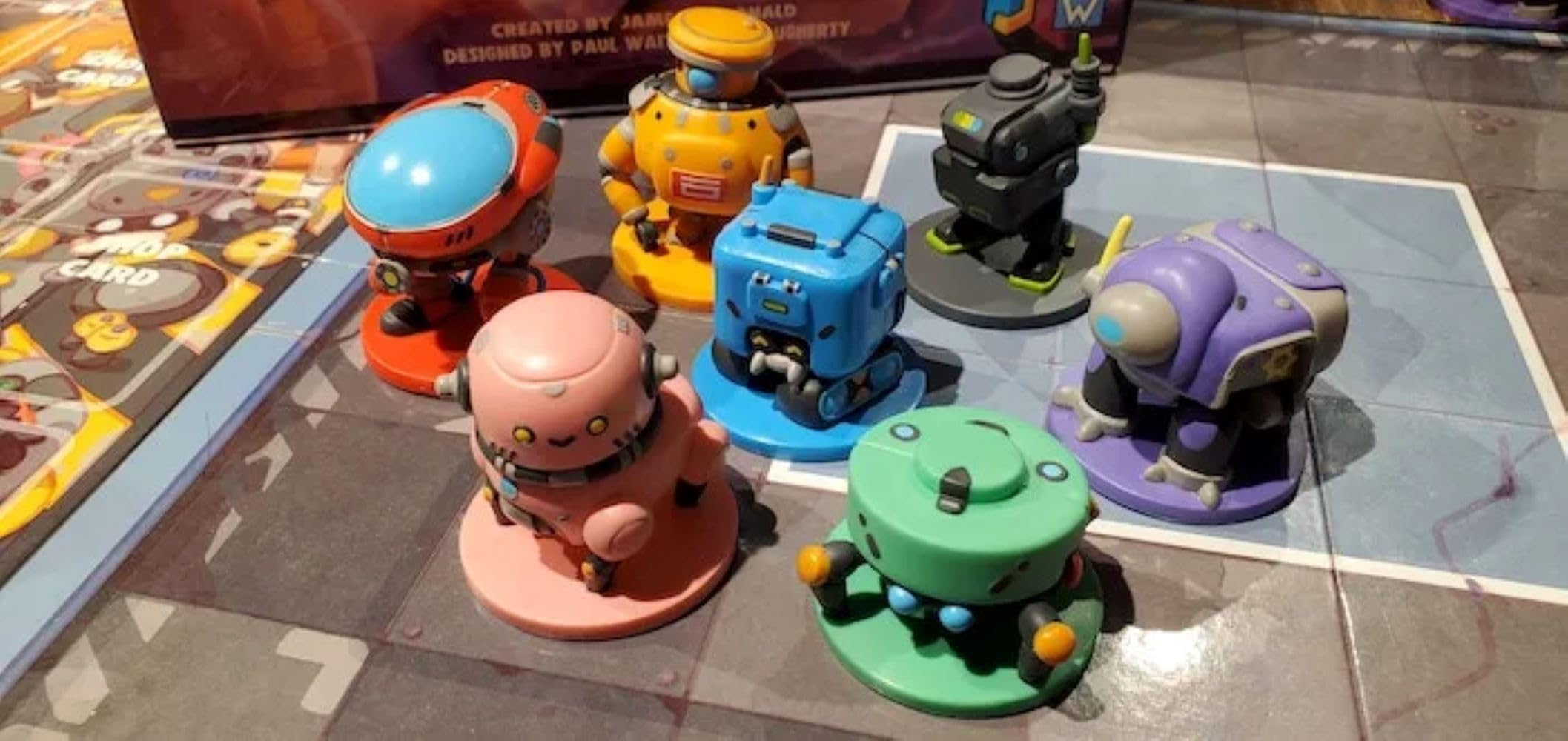 Wise Wizard Games Robot Quest Arena tokens and markers track upgrades and health.