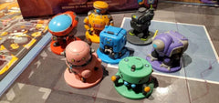 Wise Wizard Games Robot Quest Arena tokens and markers track upgrades and health.