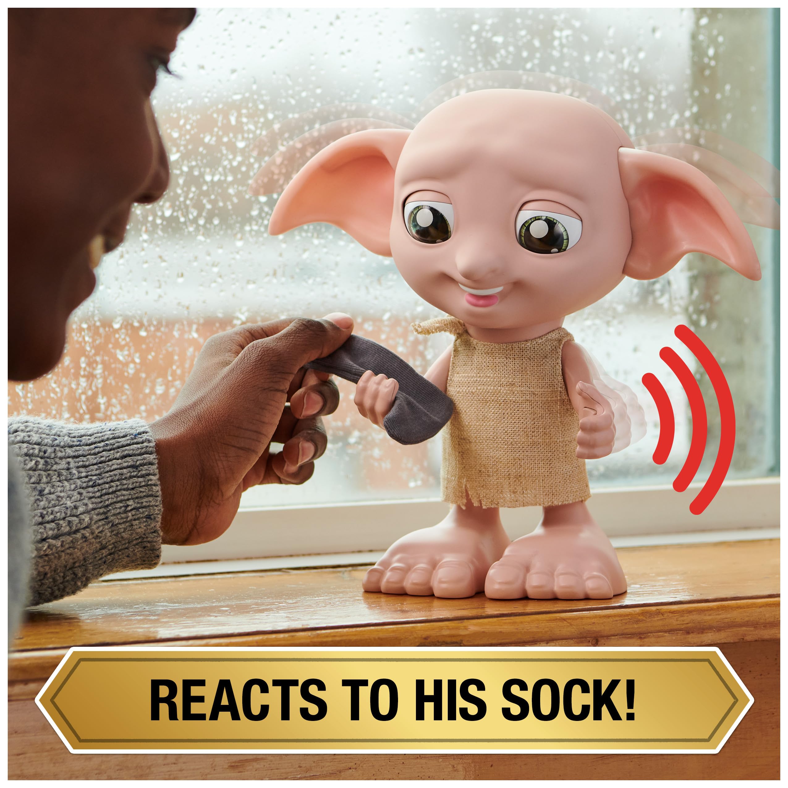 Wizarding World Dobby hand squeeze activates new phrases and movement.