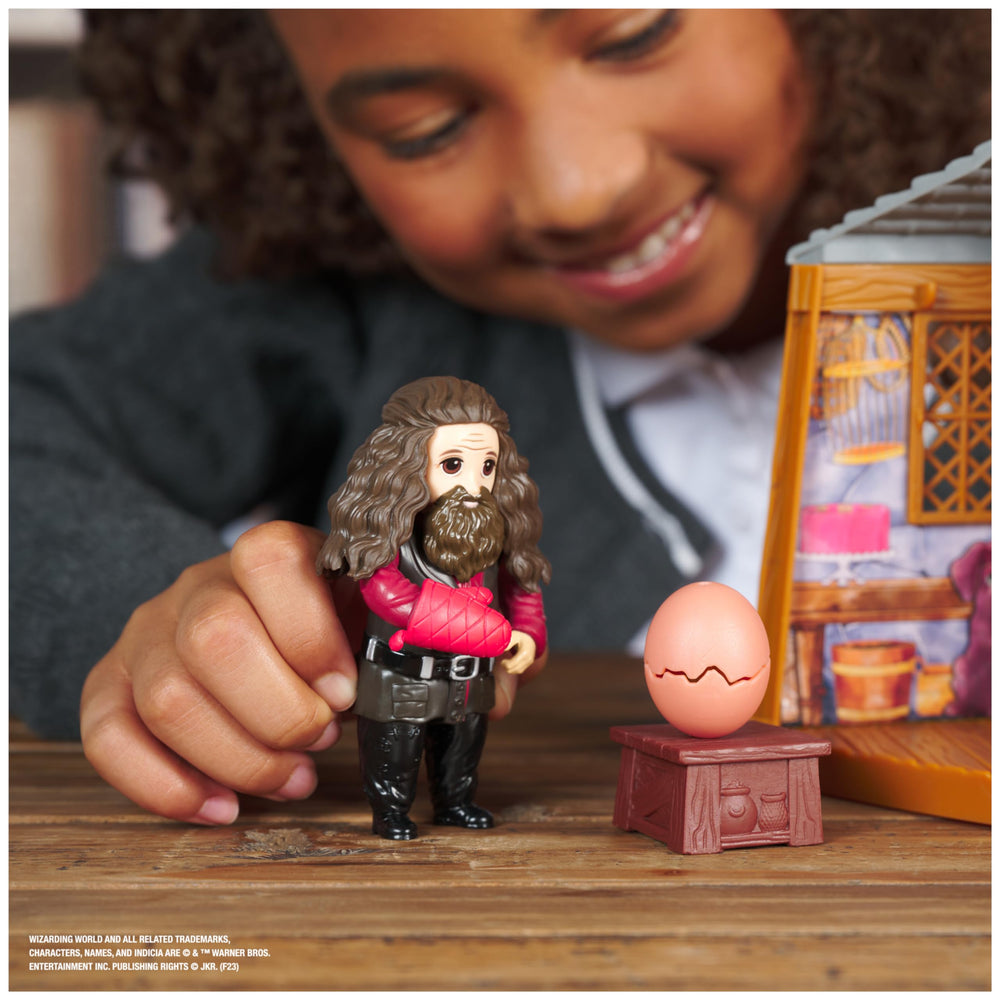 Pink umbrella accessory adds magical flair to storytelling.