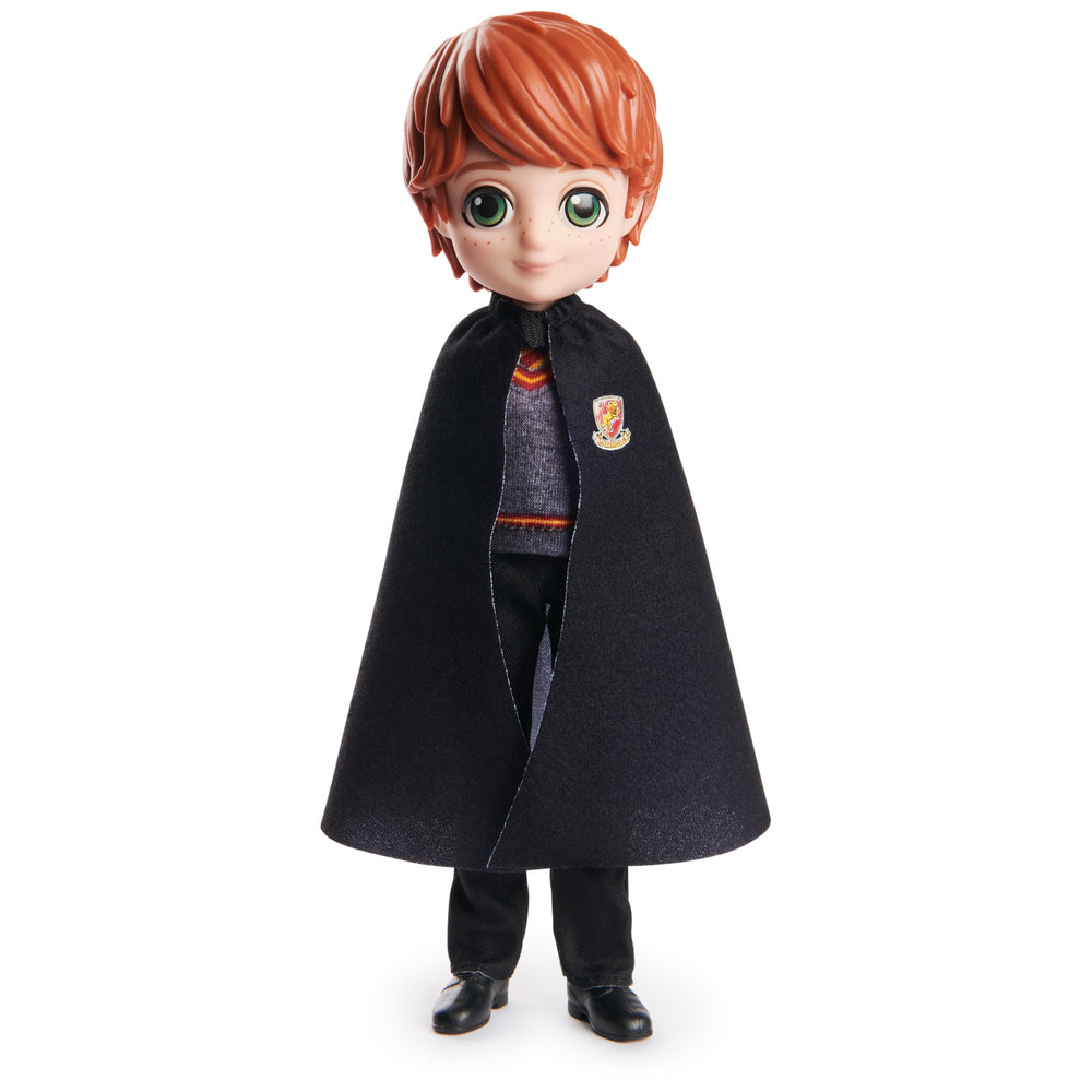 Ron Weasley doll and Gryffindor flag for Quidditch themed scenes.