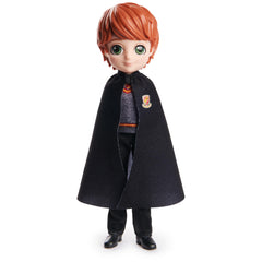 Ron Weasley doll and Gryffindor flag for Quidditch themed scenes.