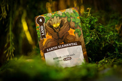 WizKids Fantasy Realms Jester and Phoenix promo cards enhance gameplay variety