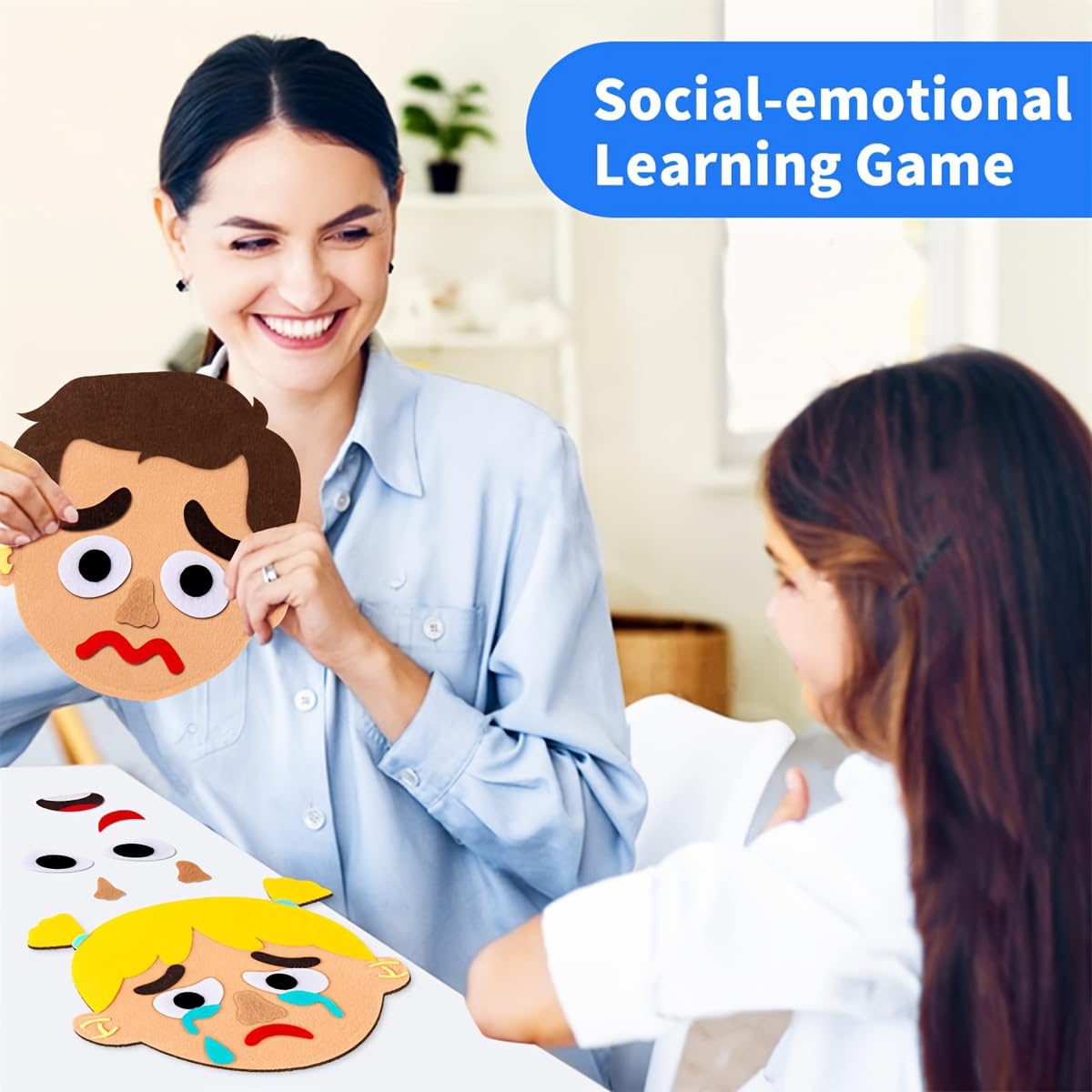 WOBOX angry-face felt piece supports understanding emotions in collaborative activities.