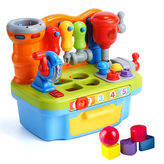 Woby workbench drill sound invites active pretend play and fine motor exploration.