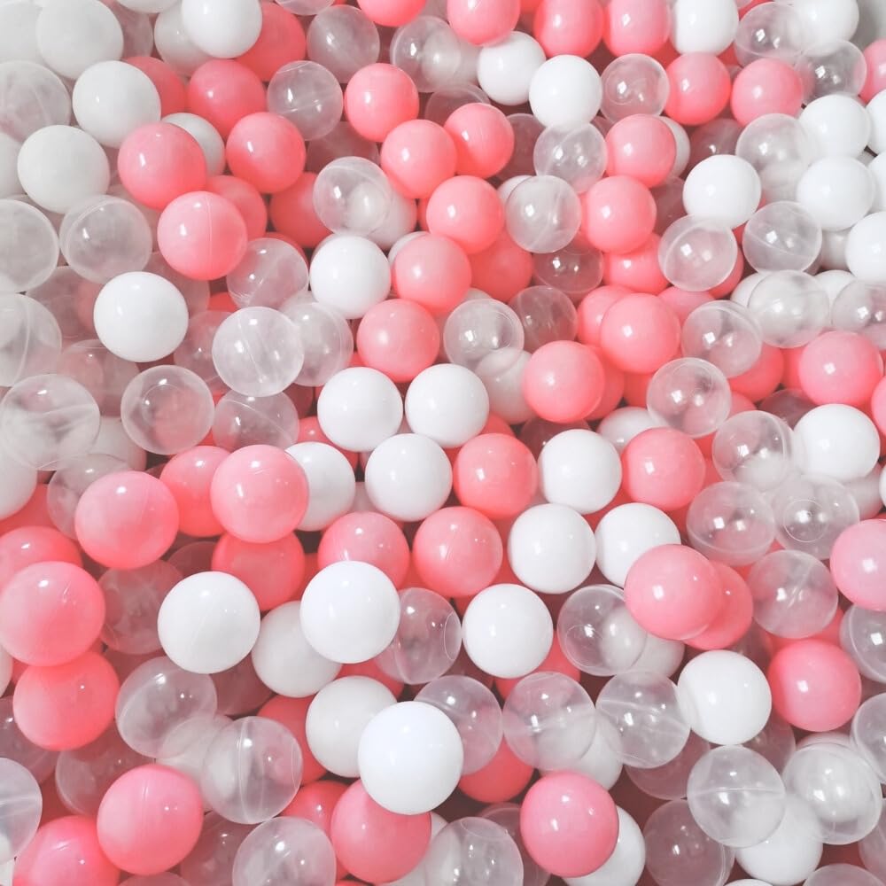 Kid in ball pit with Wonder Space balls, safe toddler play.